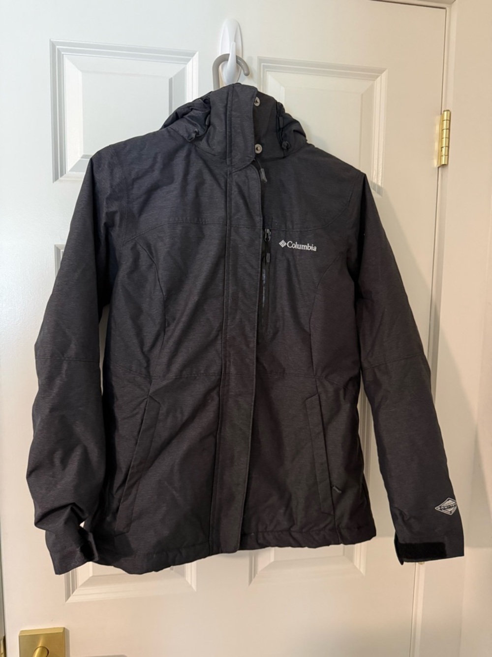 Columbia Black Jacket with Red Omni-Heat Patch and Blue Trim